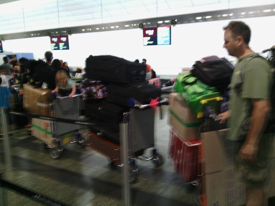 3 luggage carts of checked bags